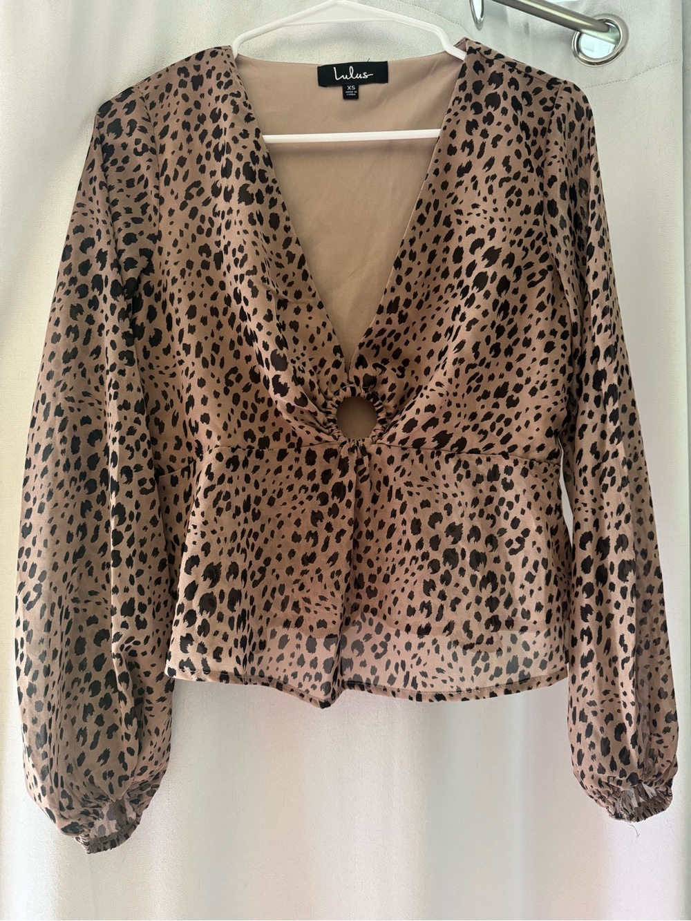 Lulu's Tan and Black Leopard Ring-Front V-Neck Top